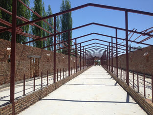 中国 プレハブの鋼鉄構造倉庫の研修会の鋼鉄牛舎および構造 サプライヤー